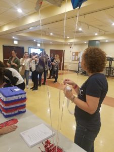 polling lines and stack of ballots